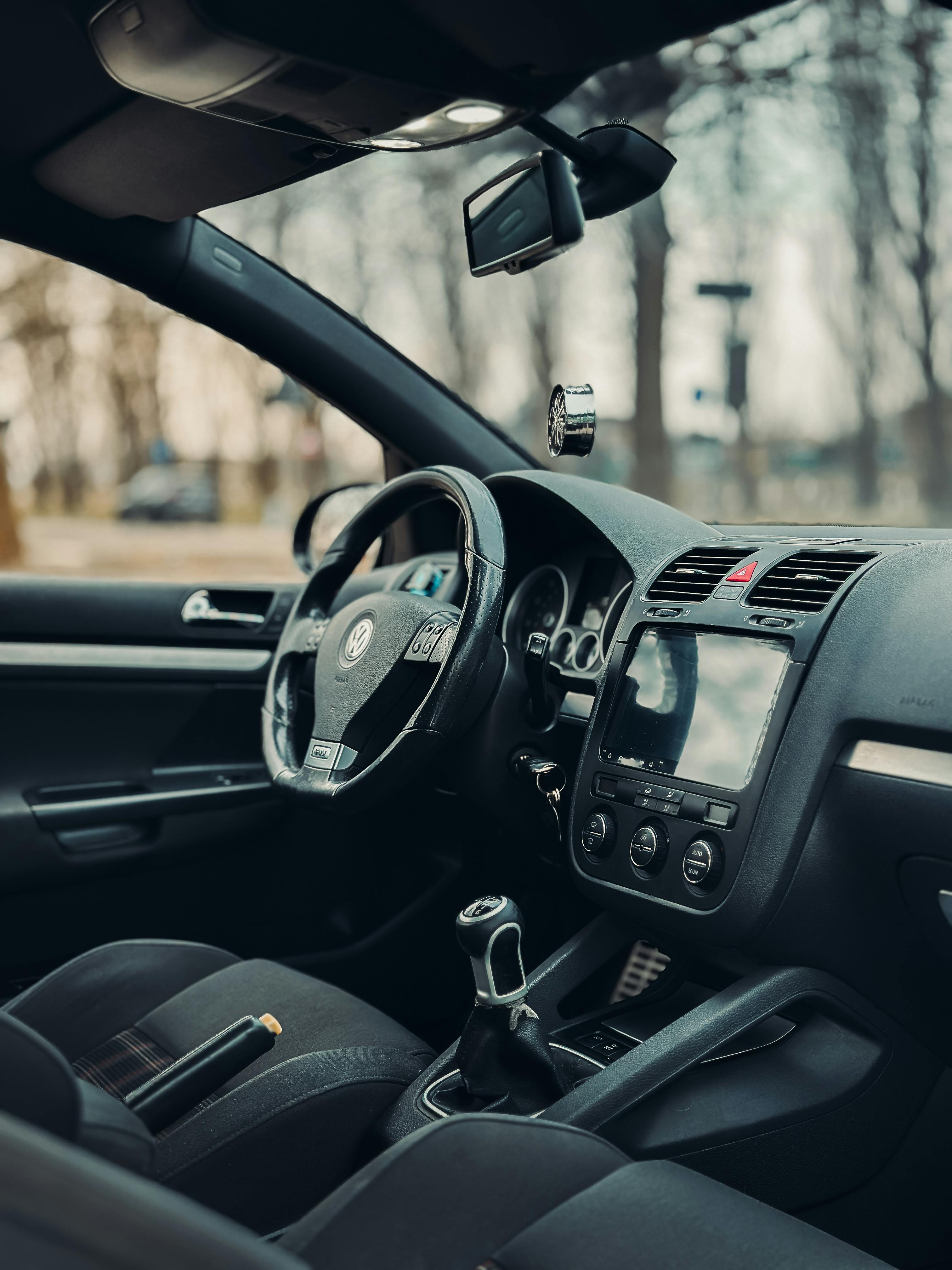 Interior View of Modern Car with Dark Dashboard · Free Stock Photo