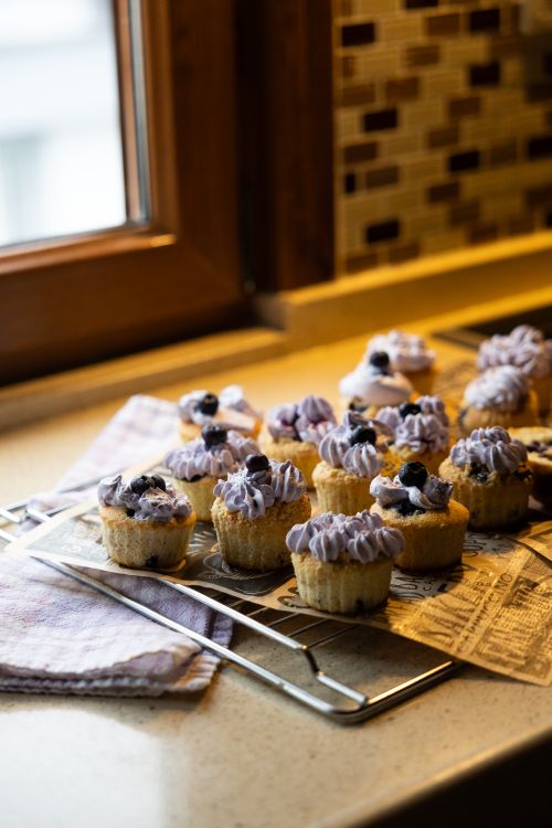 Blueberry mini muffins with lavender frosting — photo by Bigparadox on Pexels