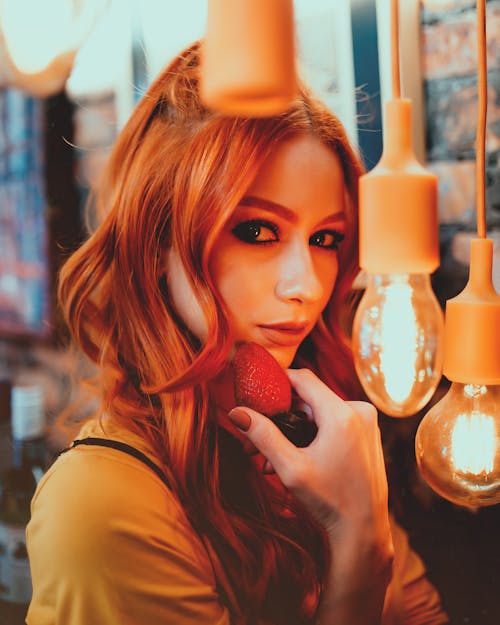 Woman Holding Strawberry