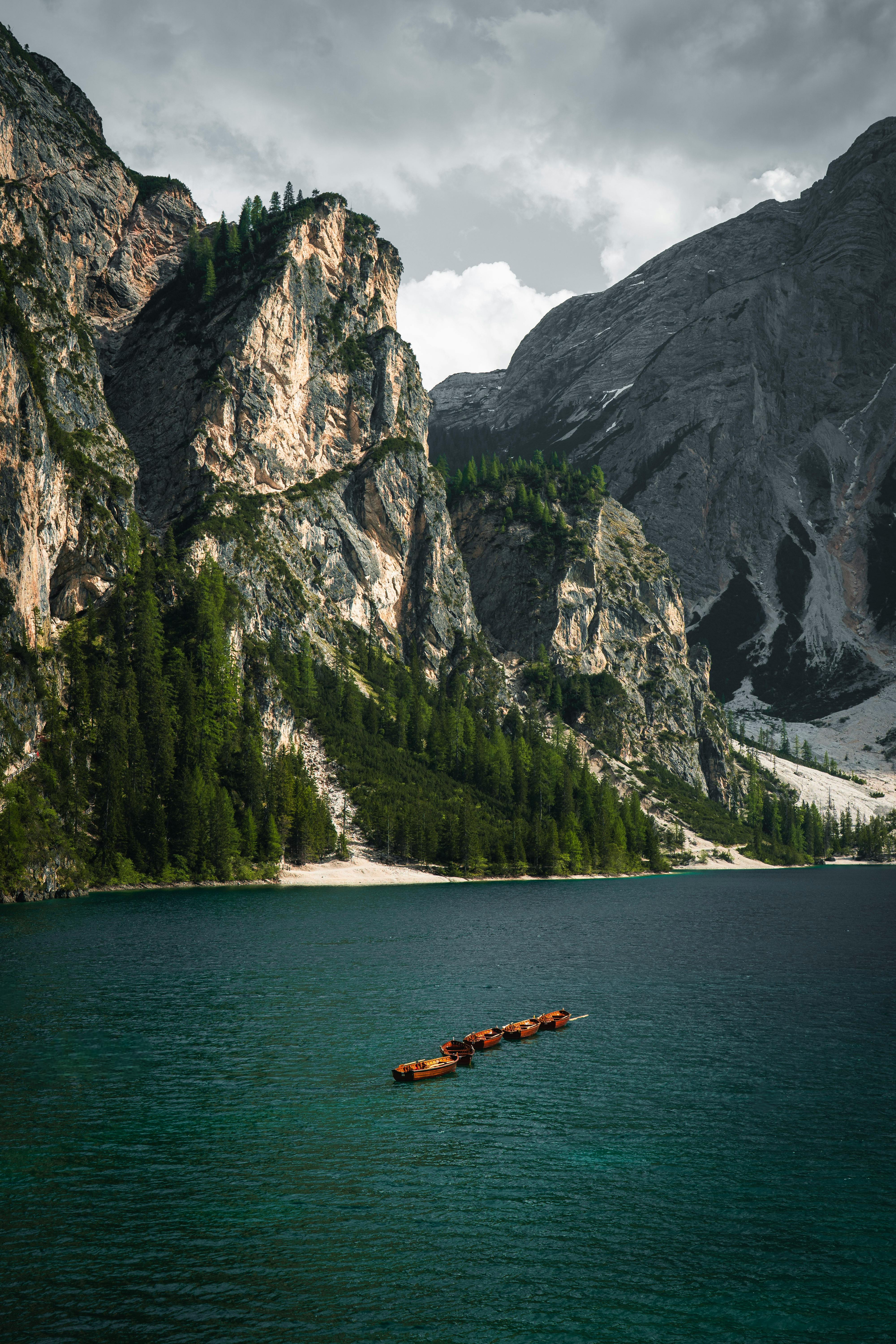 scenic view of dolomite mountains and lake in italy