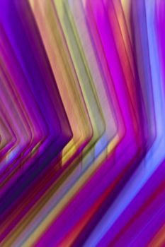 A vivid abstract artwork featuring dynamic, colorful gradient lines.