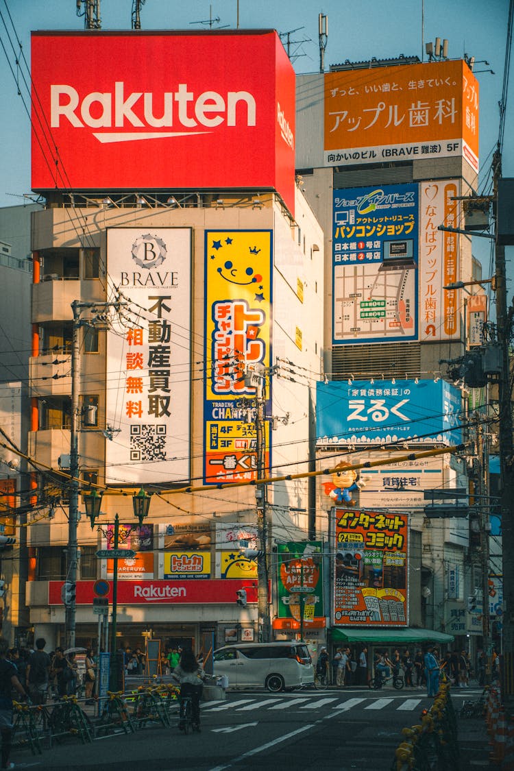 Vibrant City Street In Japan With Advertising Signs