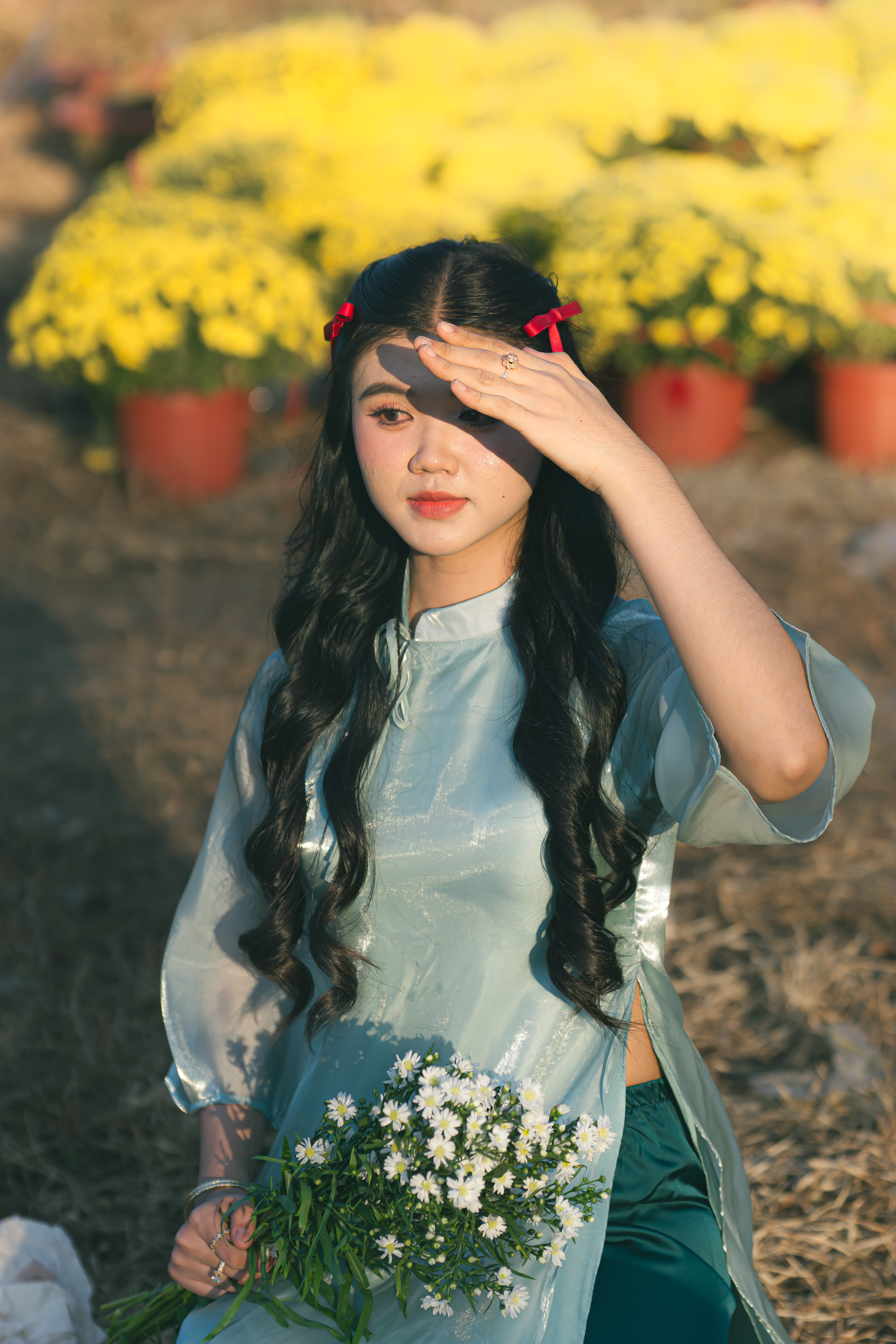 Young Woman in Traditional Dress with Flowers · Free Stock Photo