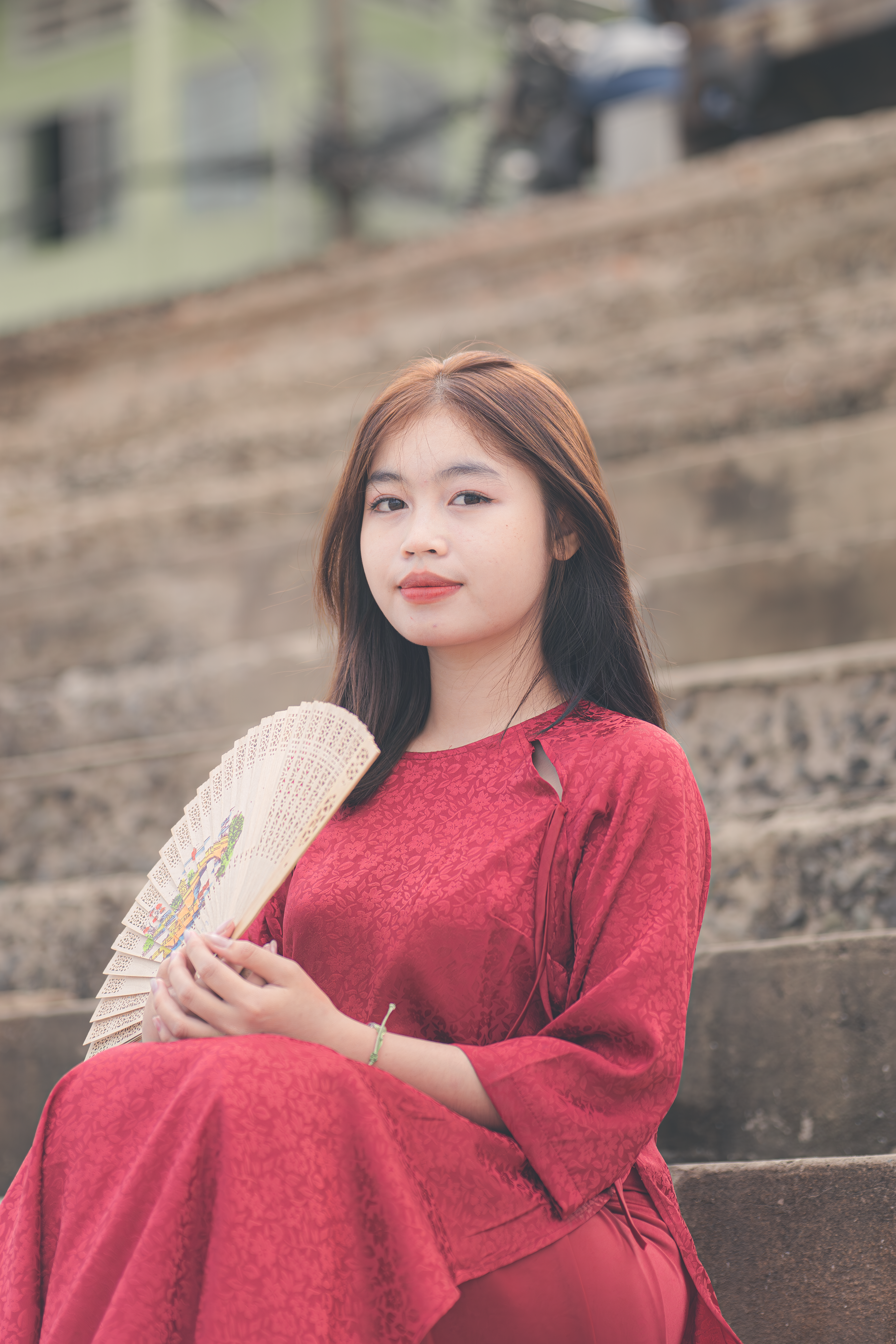 Young Woman in Traditional Red Dress with Fan · Free Stock Photo