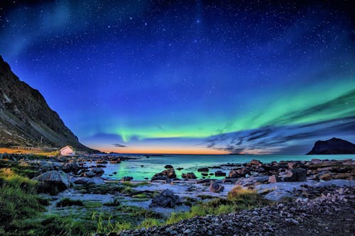 Gratis lagerfoto af aften, aurora borealis, hav