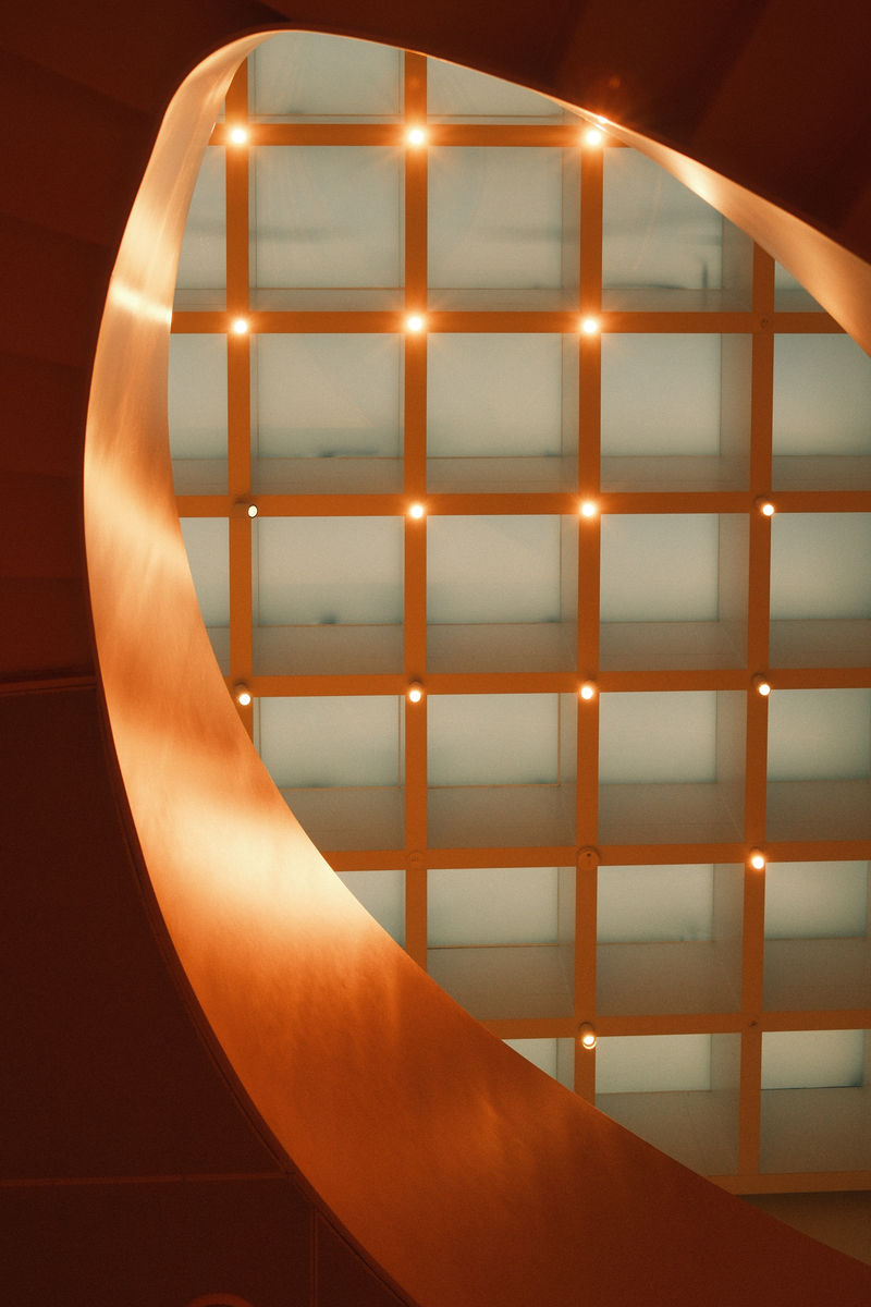 Warm architectural lighting in a curved interior