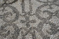 Intricate Pebble Mosaic Patterned Surface