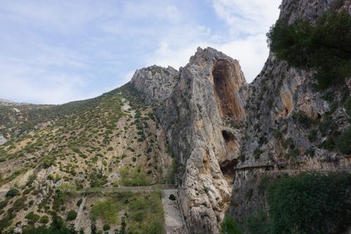 Free Dramatic rock formations and lush vegetation at El Caminito del Rey, Málaga. Stock Photo