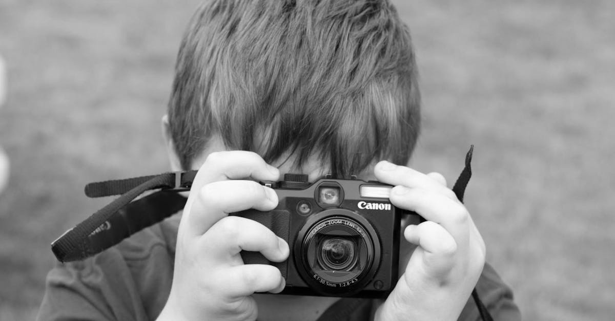 Free stock photo of canon, kid, photographer