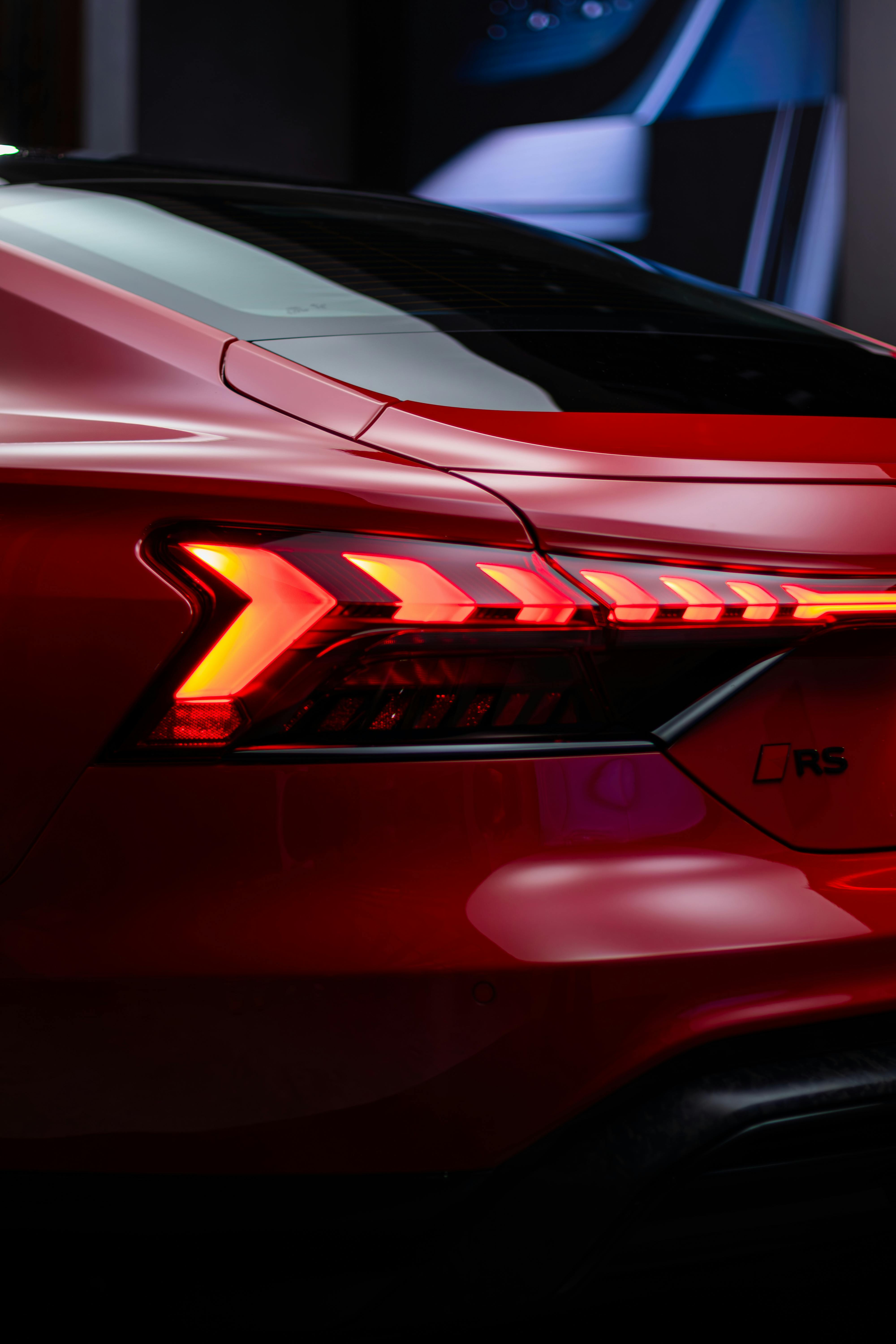Close-up of a red Audi RS tail light with studio lighting in Toronto.