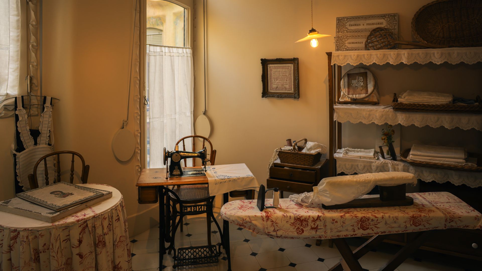 Cozy vintage sewing room with antique sewing machine, Barcelona interior charm.