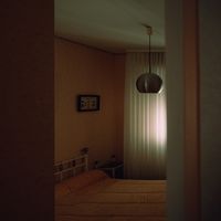 Quiet bedroom in soft late light, photo by Chris R. on Pexels