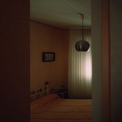Album artwork: lamp-lit room at dusk — photo by Chris R. on Pexels