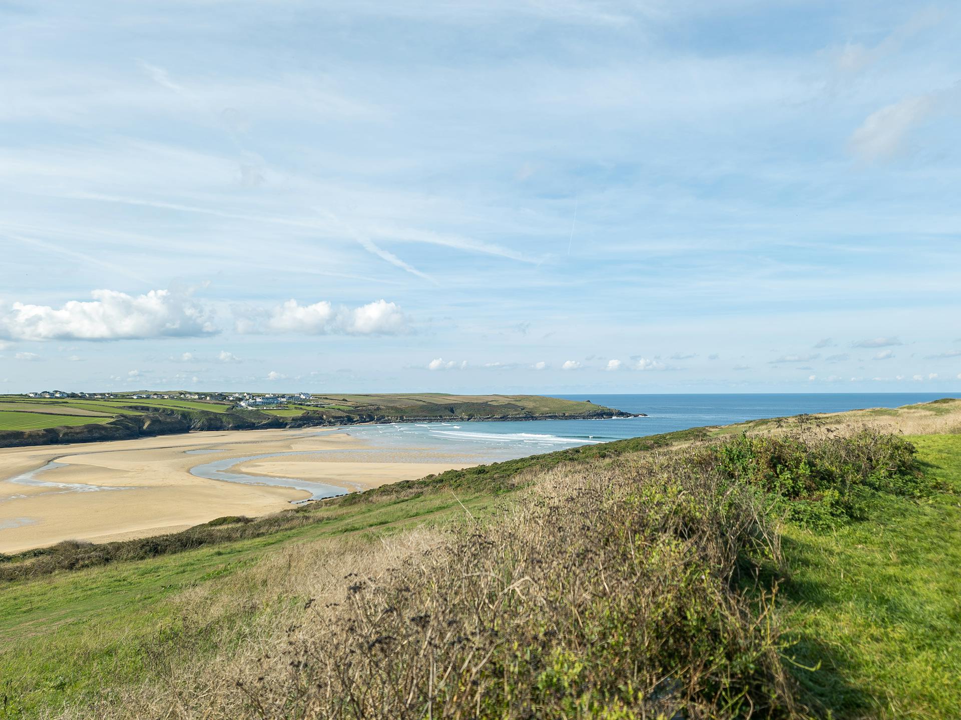 Capture the tranquil beauty of Newquay Beach in Cornwall, UK with this serene coastal landscape.