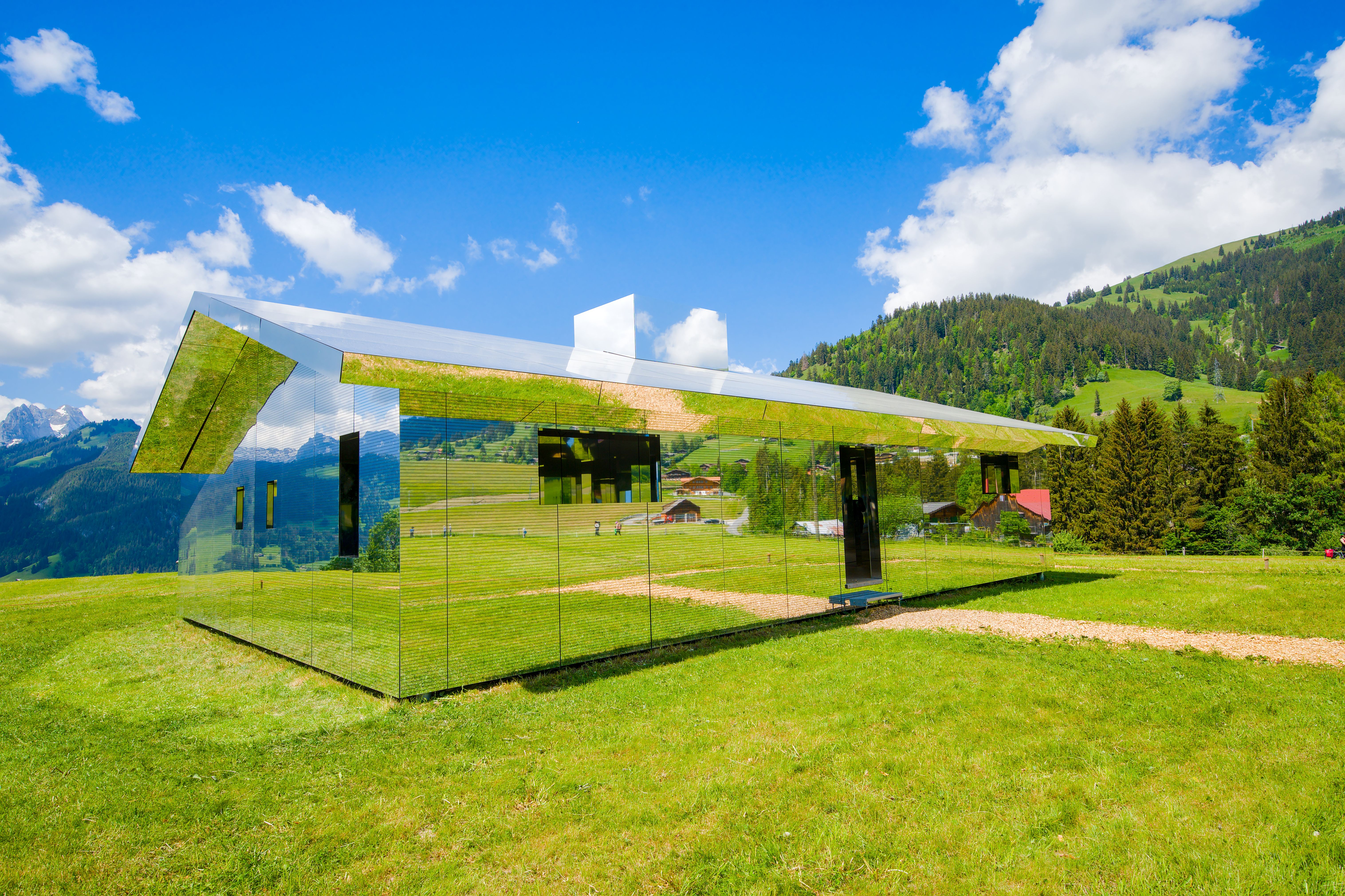 Reflective Mirror House in Swiss Countryside · Free Stock Photo