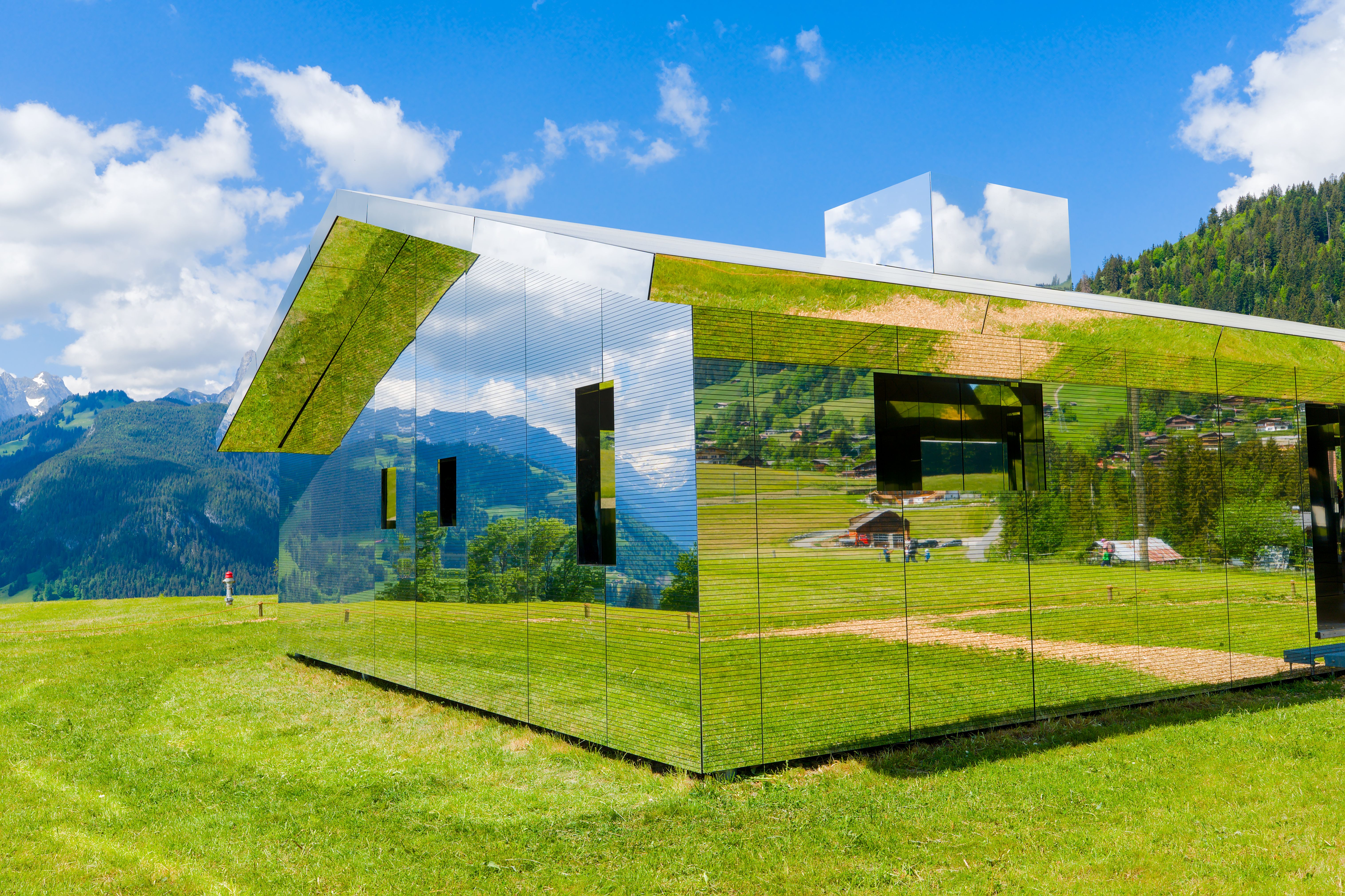 Reflective Mirror House in Swiss Countryside · Free Stock Photo
