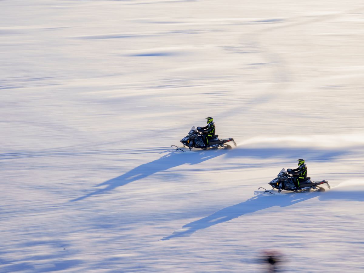 A snowmobile safari through the Lapland wilderness, Finland
