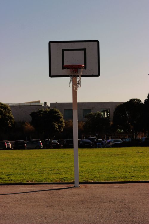 Free A solitary basketball hoop stands in an outdoor park in Esposende, Portugal. Stock Photo