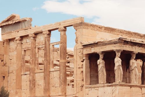 Free Close-up of the Erechtheion Temple's iconic caryatids on the Acropolis in Athens, Greece. Stock Photo