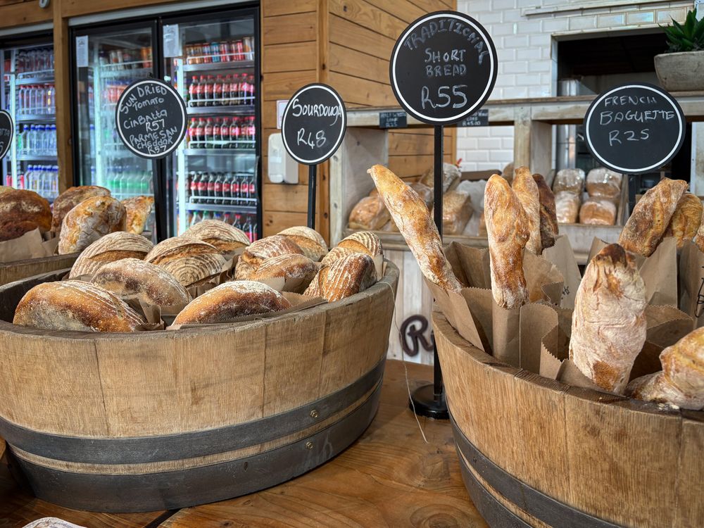 Rustic Bakery Display with Various Bread Assortments · Free Stock Photo