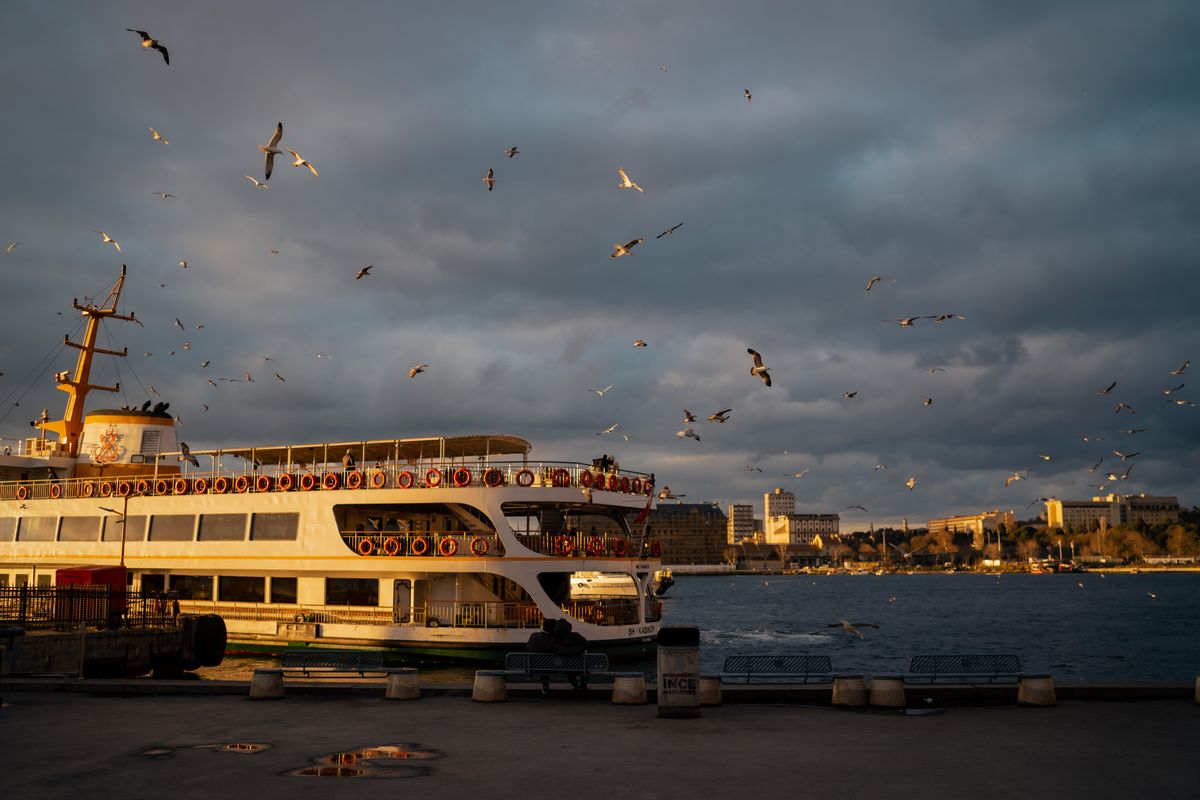 A Bosphorus ferry at sunset — the strait that divides and joins Istanbul's two continents.