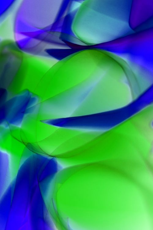 Free Vibrant abstract art with colorful light shapes in green and blue hues. Stock Photo
