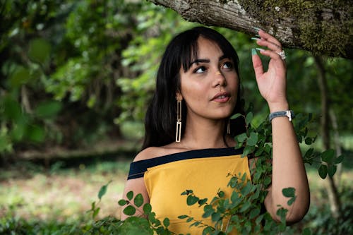 Portrait Photo of Woman Standing Under Tree