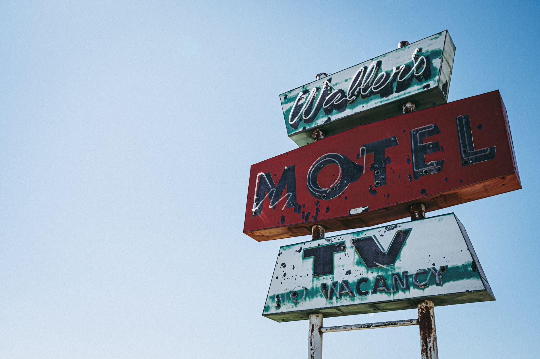 Vintage roadside motel sign for a road-trip overnight