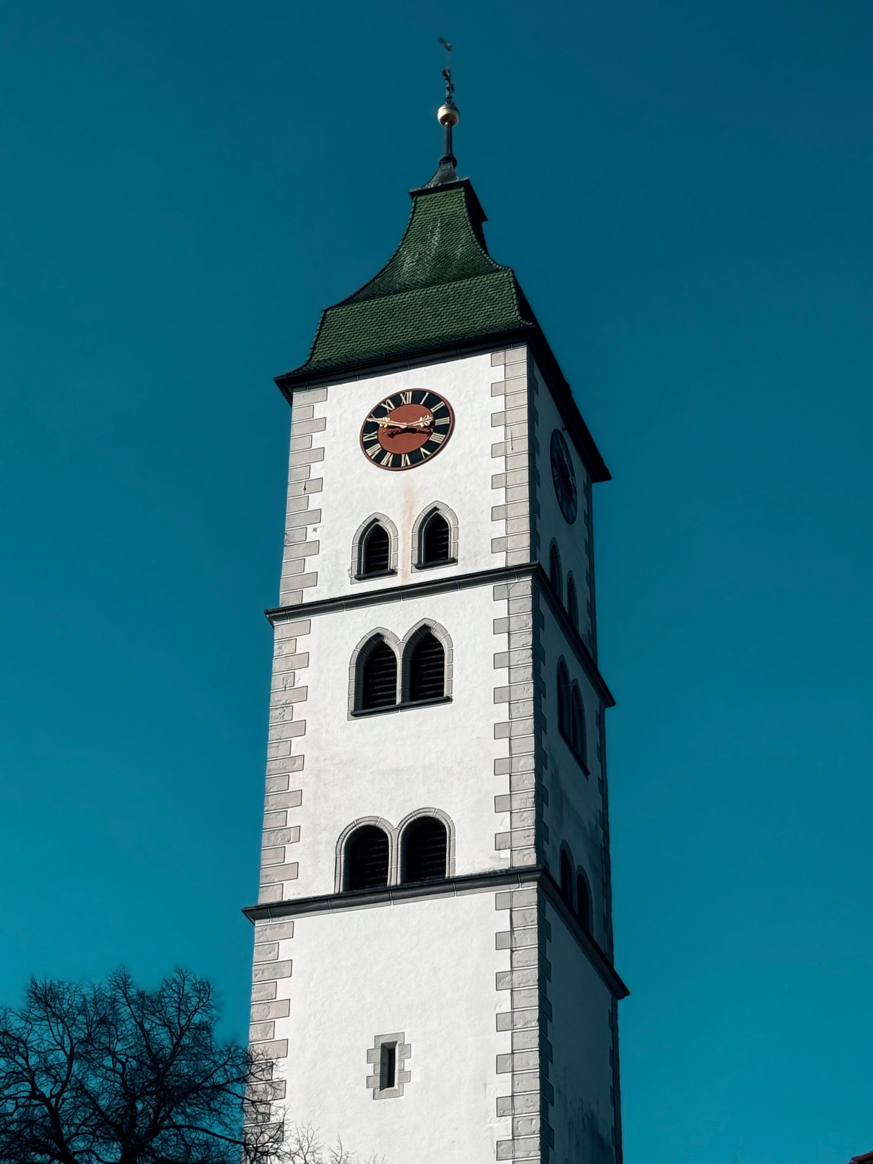 Historic Clock Tower Against Vibrant Sky · Free Stock Photo