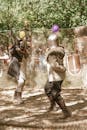 Medieval Knight Combat with Balloon Helmets Outdoors