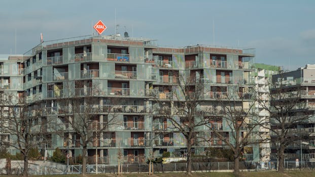 Modern apartment building in Wrocław, Poland, showcasing urban architecture.