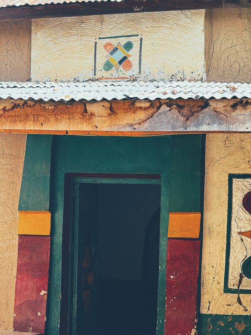 Free Colorful facade of a traditional mud house entrance in Hadejia, Nigeria. Stock Photo