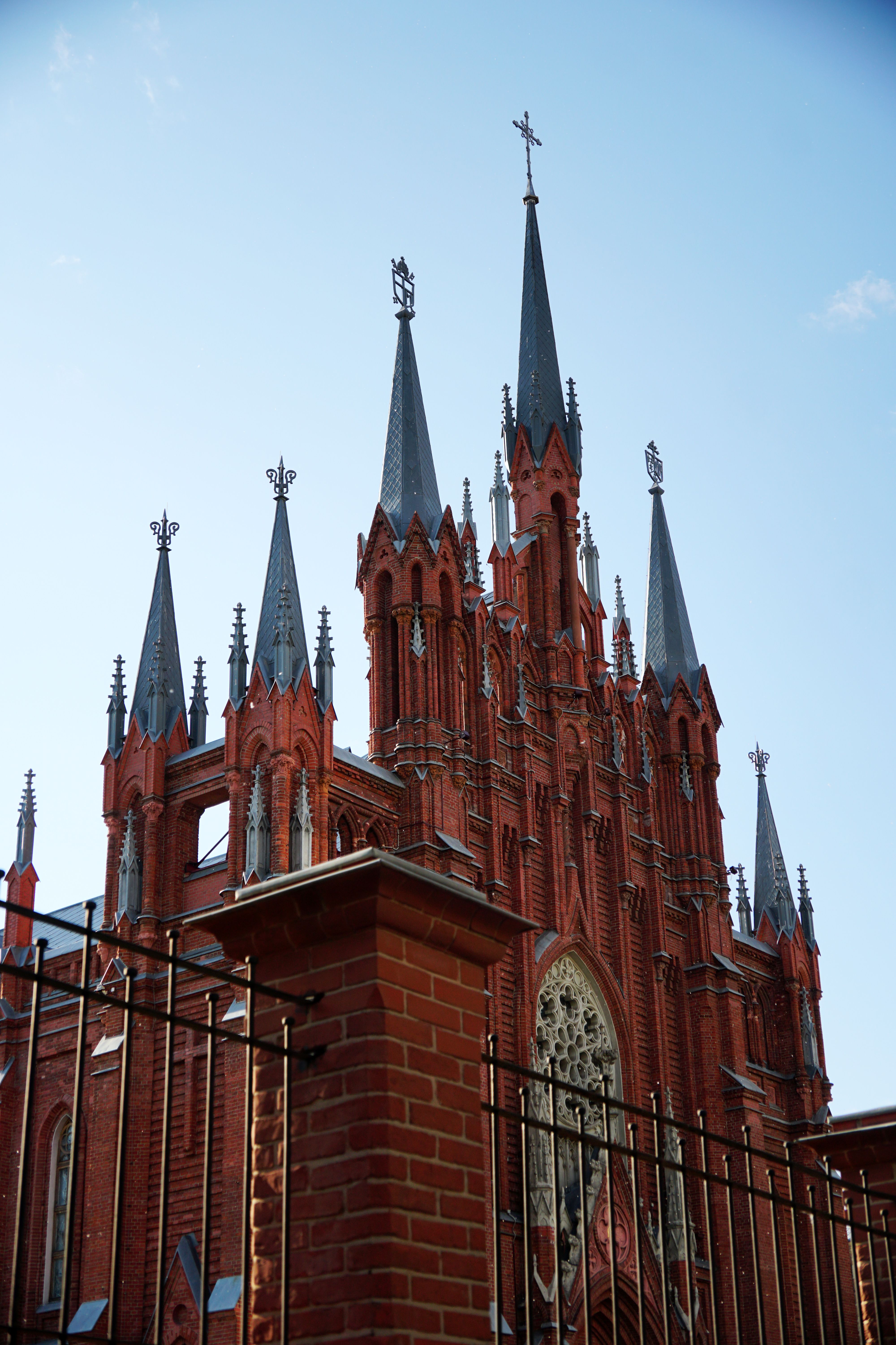 Gothic Revival Cathedral Spires against Blue Sky · Free Stock Photo