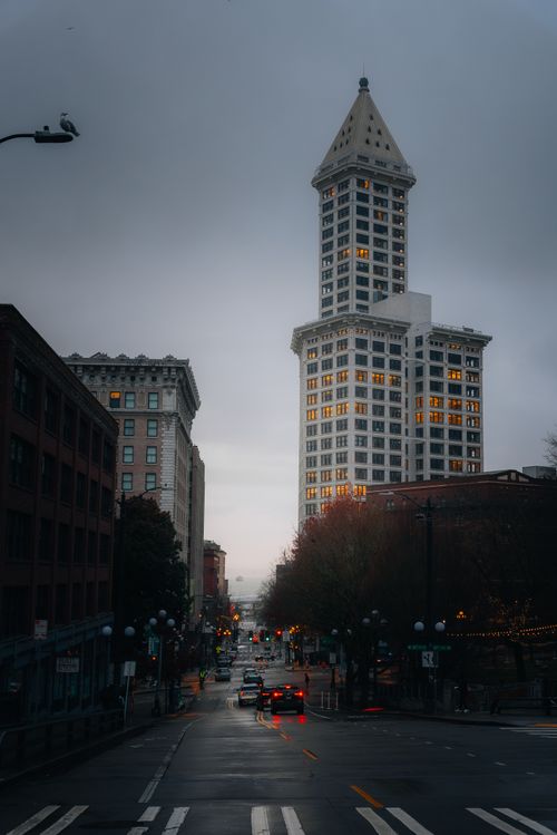 Free Capture the atmospheric mood of downtown Seattle featuring Smith Tower at twilight. Stock Photo