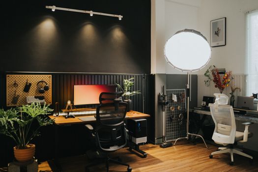 Stylishly designed home office with ergonomic chairs and ambient lighting.
