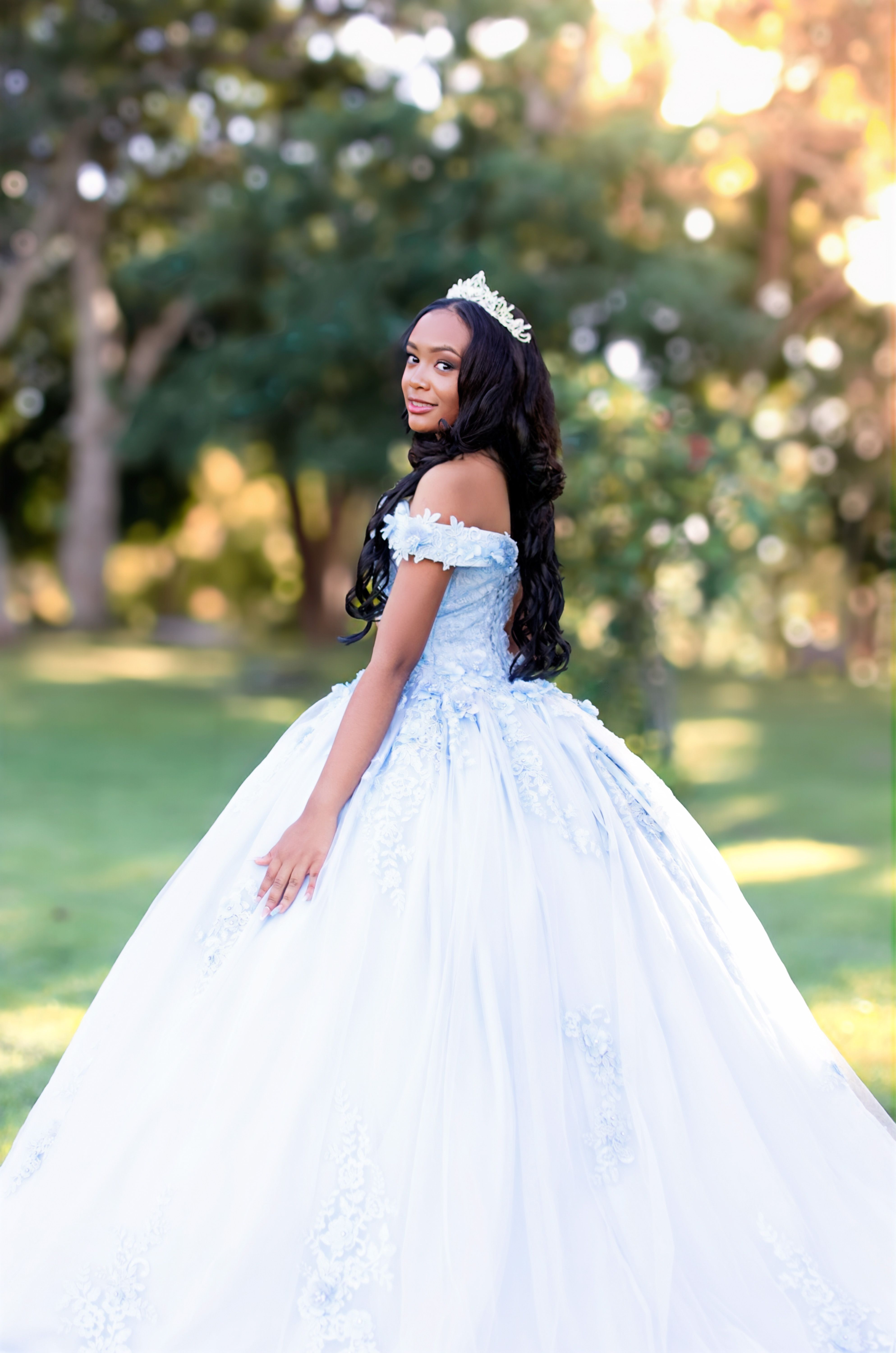 Elegant Young Woman in Ball Gown Outdoors · Free Stock Photo