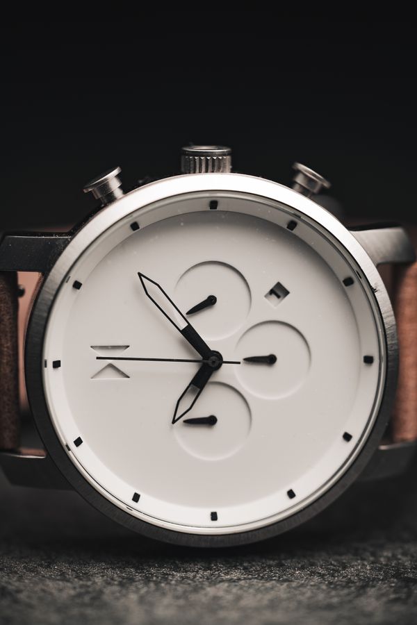 Chronograph with a white dial — photo by Erik Mclean on Pexels
