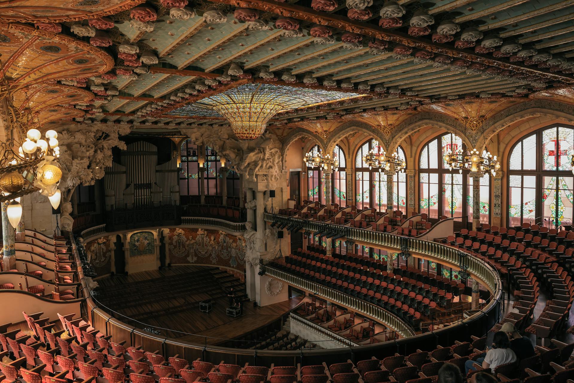 Stunning interior of Palau de la Música Catalana showcasing its ornate architecture and colorful details.