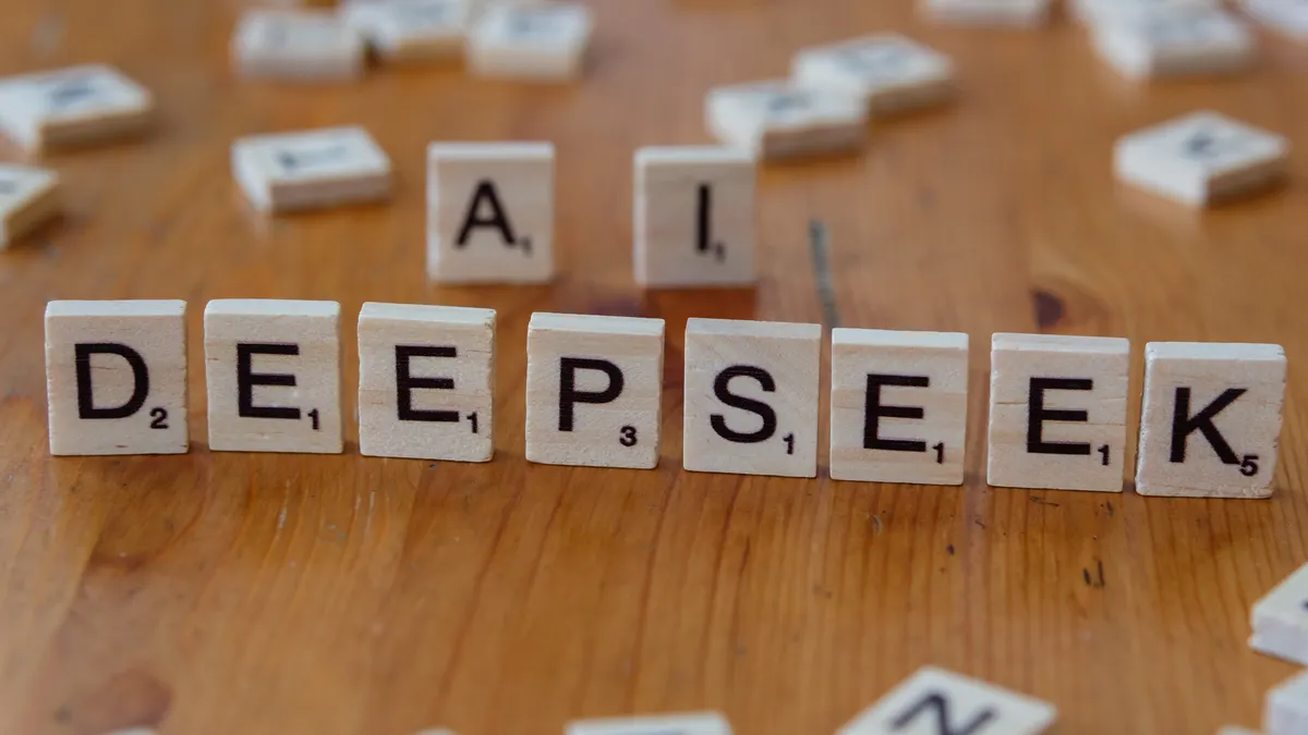 Jasper vs Surfer: how they differ for SEO content Jasper vs Surfer: how they differ for SEO content — Scrabble Tiles Spelling Deepseek AI Concept