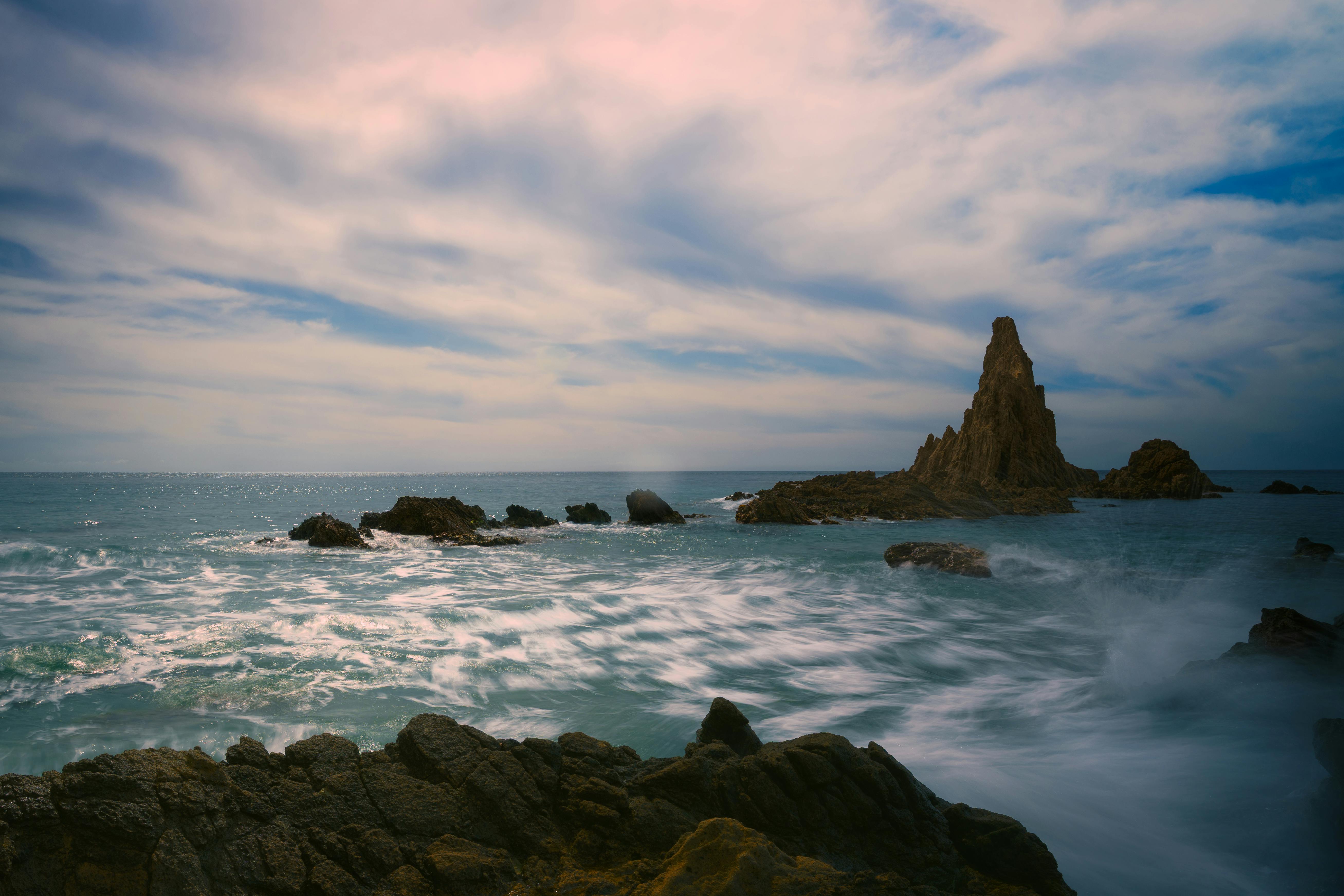 Beautiful seascape with dramatic rocky formations near Almería, Spain at sunset.