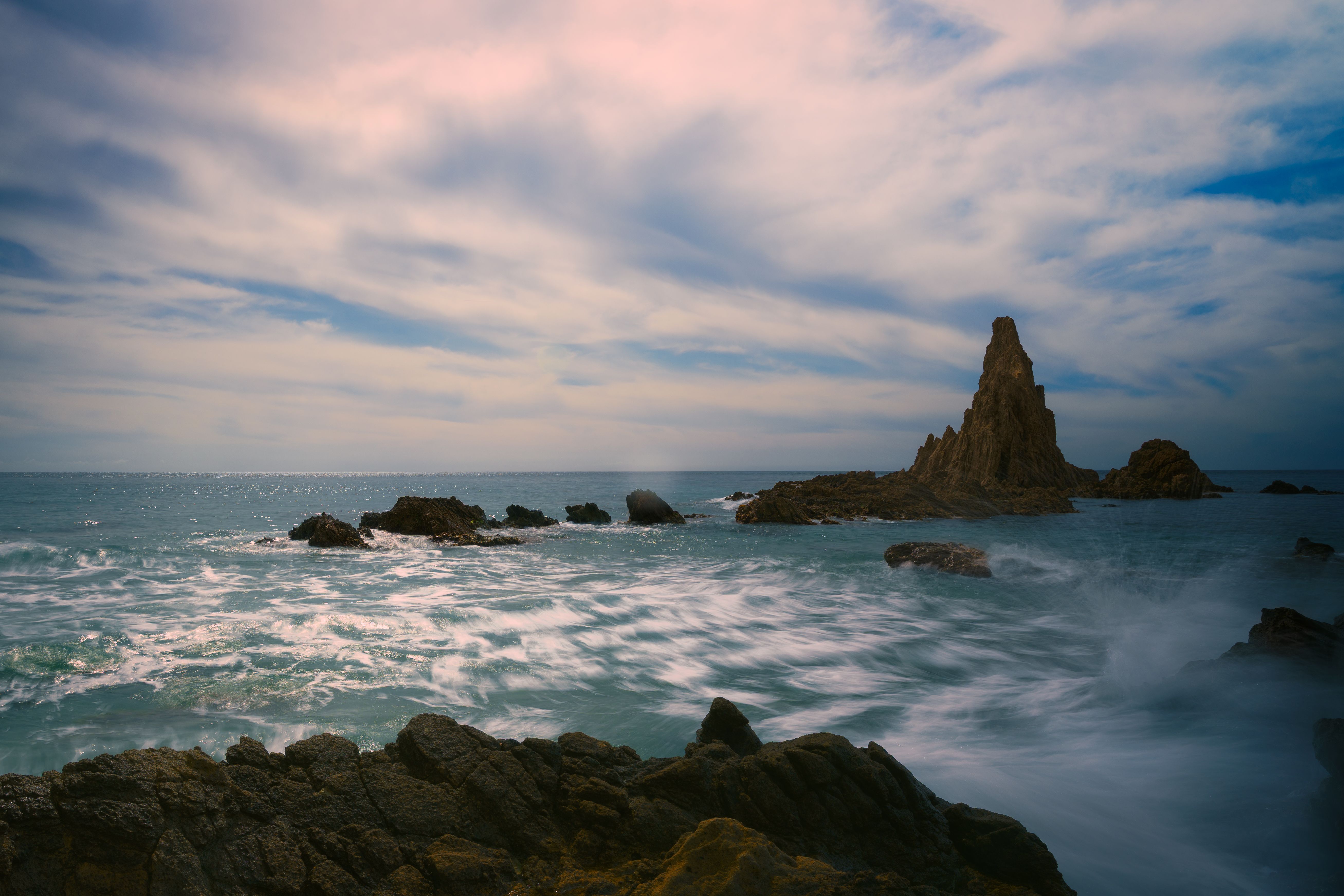 Scenic Seascape with Rugged Rock Formations · Free Stock Photo