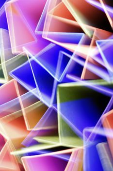 Colorful abstract geometric pattern with overlapping light shapes in vibrant hues.
