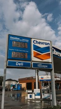 Chevron gas station in Houston, Texas with clear blue skies and price display. — photo by Meltem  B.