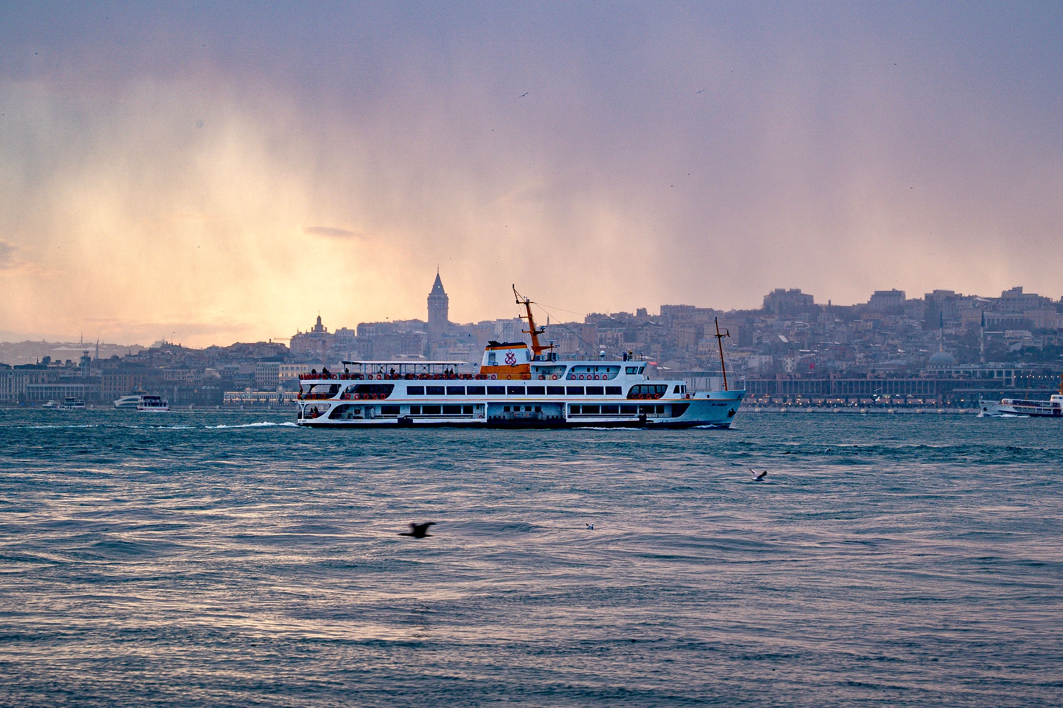 Ferry Crossing the Bosphorus in Istanbul at Sunset · Free Stock Photo