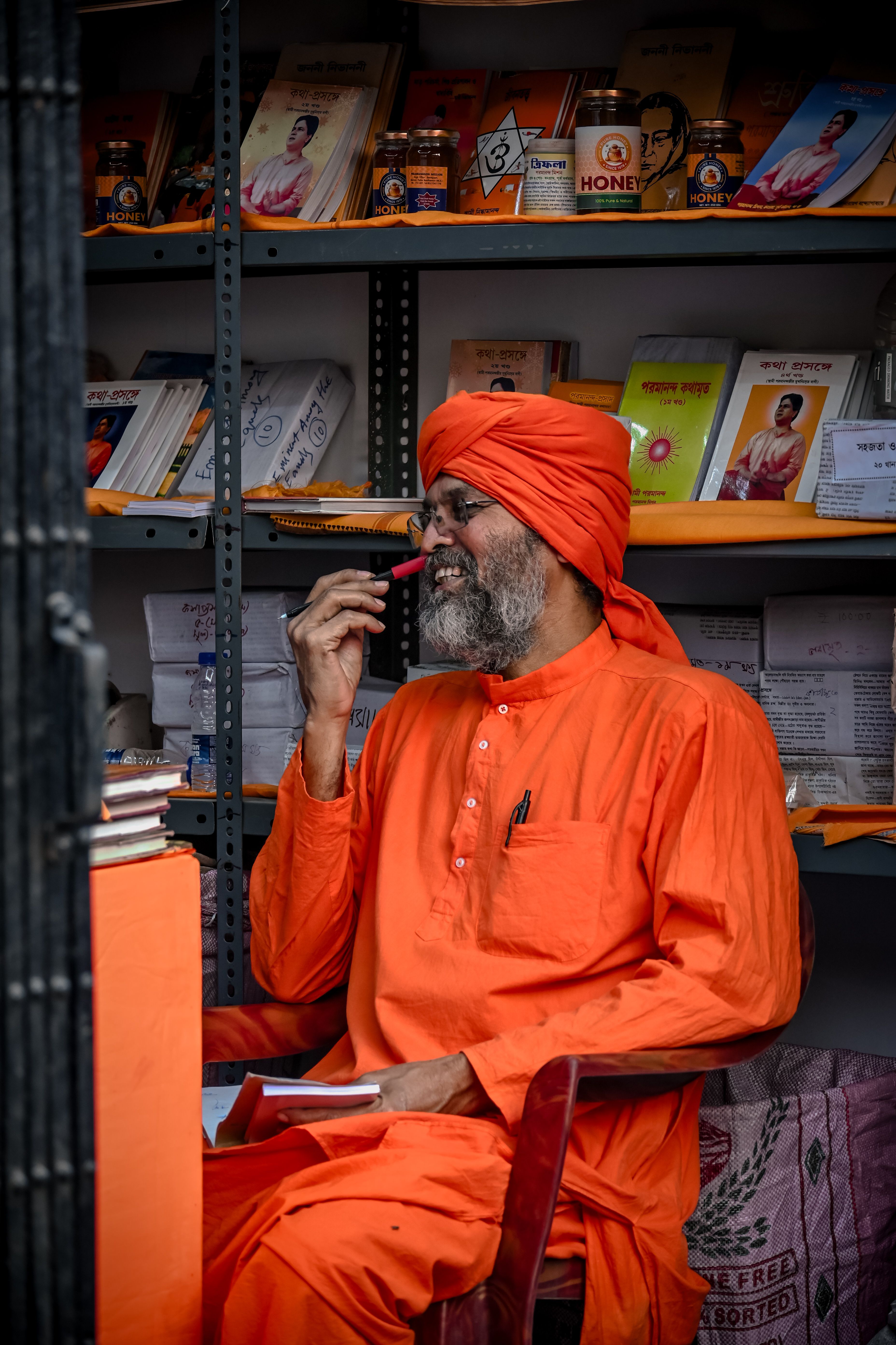 Portrait of a Man in Orange Traditional Attire · Free Stock Photo