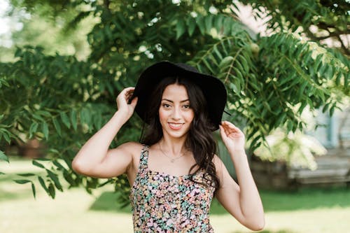 Woman Wearing Black Sunhat