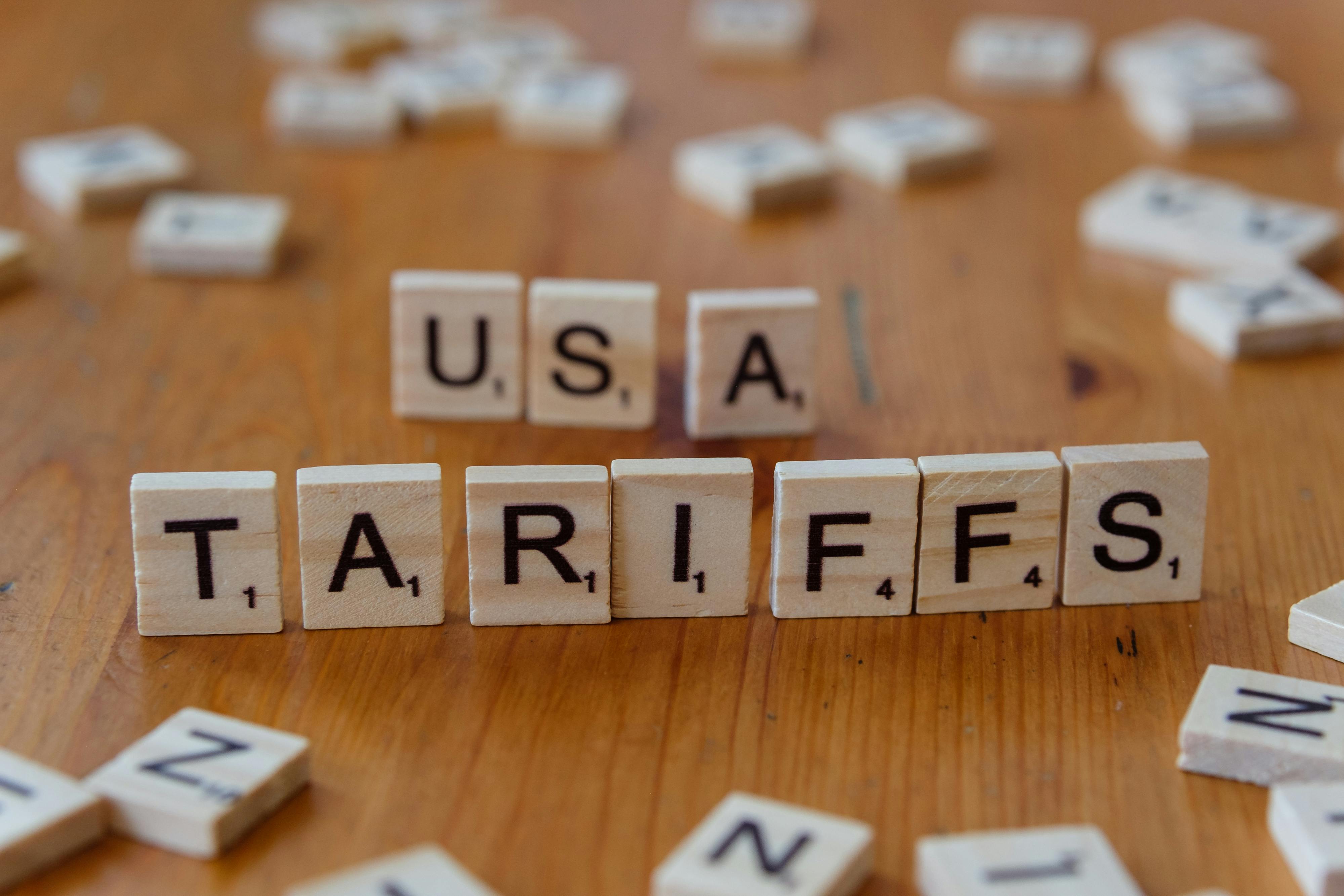 USA Tariffs Concept with Scrabble Tiles · Free Stock Photo