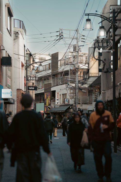 Free Authentic street scene capturing daily life and architecture in Japan. Stock Photo