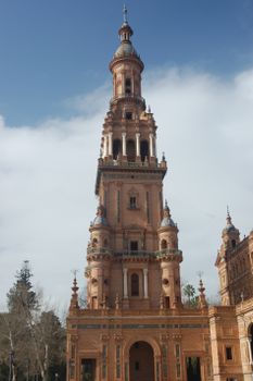 Captivating view of the iconic tower at Plaza de España in Seville, Spain.
