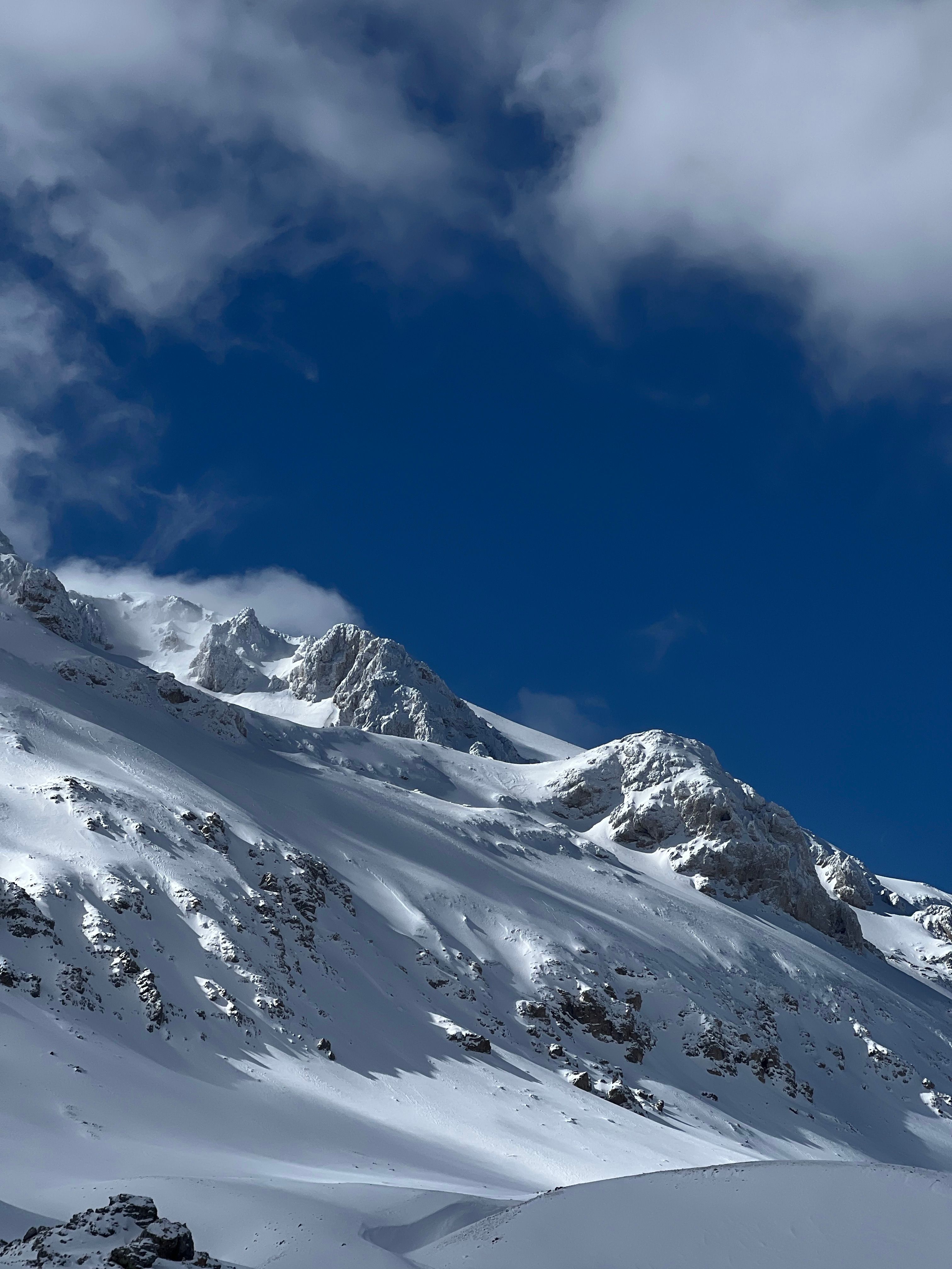 Snowy Mountains Under Clear Blue Sky in Isparta · Free Stock Photo